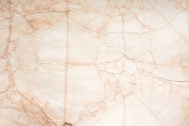 Eski kağıt çarşaf. Toz ve kirli lekelerle dolu boş bir arka plan. Eski ve antika sanat konsepti. Ayrıntılı yakın çekim stüdyo çekimi. Ön manzara. Ayarlanmış