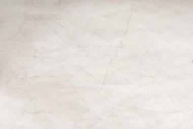 Eski kağıt çarşaf. Toz ve kirli lekelerle dolu boş bir arka plan. Eski ve antika sanat konsepti. Ayrıntılı yakın çekim stüdyo çekimi. Ön manzara. Ayarlanmış