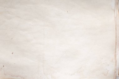 Eski kağıt çarşaf. Toz ve kirli lekelerle dolu boş bir arka plan. Eski ve antika sanat konsepti. Ayrıntılı yakın çekim stüdyo çekimi. Ön manzara. Ayarlanmış