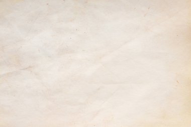 Eski kağıt çarşaf. Toz ve kirli lekelerle dolu boş bir arka plan. Eski ve antika sanat konsepti. Ayrıntılı yakın çekim stüdyo çekimi. Ön manzara. Ayarlanmış