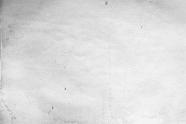 Eski kağıt çarşaf. Toz ve kirli lekelerle dolu boş bir arka plan. Eski ve antika sanat konsepti. Ayrıntılı yakın çekim stüdyo çekimi. Ön manzara. Ayarlanmış