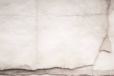 Eski kağıt çarşaf. Toz ve kirli lekelerle dolu boş bir arka plan. Eski ve antika sanat konsepti. Ayrıntılı yakın çekim stüdyo çekimi. Ön manzara. Ayarlanmış