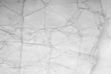 Eski kağıt çarşaf. Toz ve kirli lekelerle dolu boş bir arka plan. Eski ve antika sanat konsepti. Ayrıntılı yakın çekim stüdyo çekimi. Ön manzara. Ayarlanmış