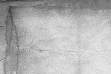 Eski kağıt çarşaf. Toz ve kirli lekelerle dolu boş bir arka plan. Eski ve antika sanat konsepti. Ayrıntılı yakın çekim stüdyo çekimi. Ön manzara. Ayarlanmış