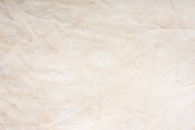 Eski kağıt çarşaf. Toz ve kirli lekelerle dolu boş bir arka plan. Eski ve antika sanat konsepti. Ayrıntılı yakın çekim stüdyo çekimi. Ön manzara. Ayarlanmış