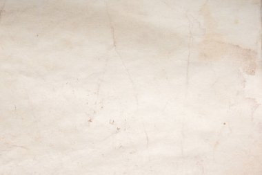 Eski kağıt çarşaf. Toz ve kirli lekelerle dolu boş bir arka plan. Eski ve antika sanat konsepti. Ayrıntılı yakın çekim stüdyo çekimi. Ön manzara. Ayarlanmış