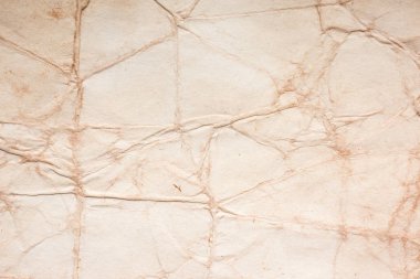 Eski kağıt çarşaf. Toz ve kirli lekelerle dolu boş bir arka plan. Eski ve antika sanat konsepti. Ayrıntılı yakın çekim stüdyo çekimi. Ön manzara. Ayarlanmış