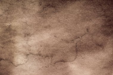 Eski kağıt çarşaf. Toz ve kirli lekelerle dolu boş bir arka plan. Eski ve antika sanat konsepti. Ayrıntılı yakın çekim stüdyo çekimi. Ön manzara. Ayarlanmış