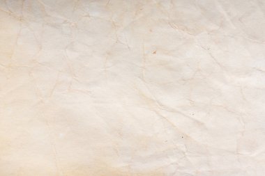 Eski kağıt çarşaf. Toz ve kirli lekelerle dolu boş bir arka plan. Eski ve antika sanat konsepti. Ayrıntılı yakın çekim stüdyo çekimi. Ön manzara. Ayarlanmış