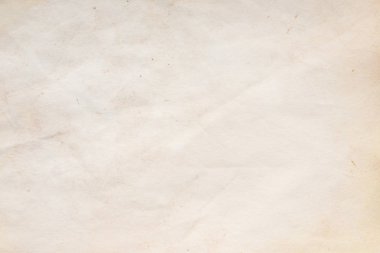 Eski kağıt çarşaf. Toz ve kirli lekelerle dolu boş bir arka plan. Eski ve antika sanat konsepti. Ayrıntılı yakın çekim stüdyo çekimi. Ön manzara. Ayarlanmış