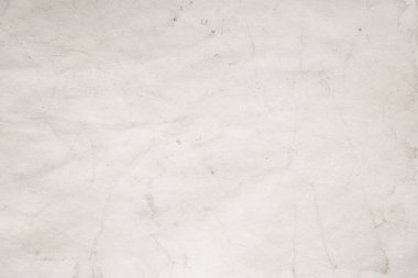 Eski kağıt çarşaf. Toz ve kirli lekelerle dolu boş bir arka plan. Eski ve antika sanat konsepti. Ayrıntılı yakın çekim stüdyo çekimi. Ön manzara. Ayarlanmış