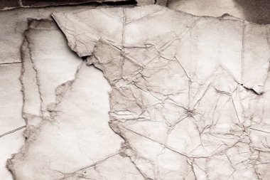 Eski kağıt çarşaf. Toz ve kirli lekelerle dolu boş bir arka plan. Eski ve antika sanat konsepti. Ayrıntılı yakın çekim stüdyo çekimi. Ön manzara. Ayarlanmış