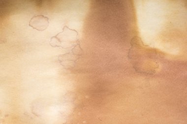 Eski kağıt çarşaf. Toz ve kirli lekelerle dolu boş bir arka plan. Eski ve antika sanat konsepti. Ayrıntılı yakın çekim stüdyo çekimi. Ön manzara. Ayarlanmış