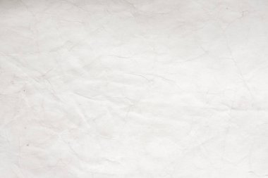 Eski kağıt çarşaf. Toz ve kirli lekelerle dolu boş bir arka plan. Eski ve antika sanat konsepti. Ayrıntılı yakın çekim stüdyo çekimi. Ön manzara. Ayarlanmış