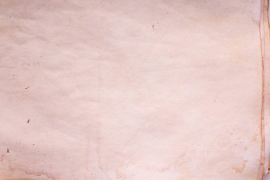 Eski kağıt çarşaf. Toz ve kirli lekelerle dolu boş bir arka plan. Eski ve antika sanat konsepti. Ayrıntılı yakın çekim stüdyo çekimi. Ön manzara. Ayarlanmış