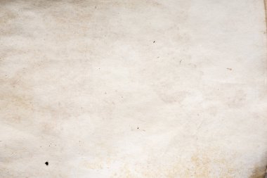 Eski kağıt çarşaf. Toz ve kirli lekelerle dolu boş bir arka plan. Eski ve antika sanat konsepti. Ayrıntılı yakın çekim stüdyo çekimi. Ön manzara. Ayarlanmış