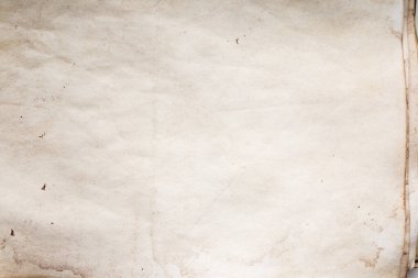 Eski kağıt çarşaf. Toz ve kirli lekelerle dolu boş bir arka plan. Eski ve antika sanat konsepti. Ayrıntılı yakın çekim stüdyo çekimi. Ön manzara. Ayarlanmış