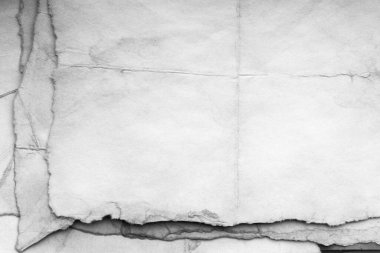 Eski kağıt çarşaf. Toz ve kirli lekelerle dolu boş bir arka plan. Eski ve antika sanat konsepti. Ayrıntılı yakın çekim stüdyo çekimi. Ön manzara. Ayarlanmış