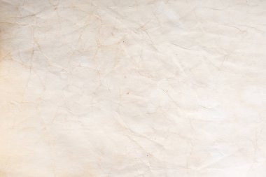 Eski kağıt çarşaf. Toz ve kirli lekelerle dolu boş bir arka plan. Eski ve antika sanat konsepti. Ayrıntılı yakın çekim stüdyo çekimi. Ön manzara. Ayarlanmış