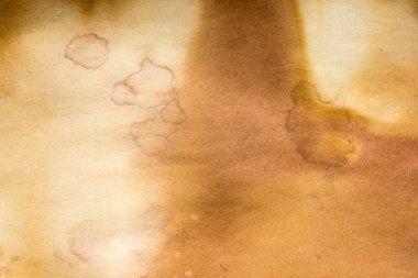 Eski kağıt çarşaf. Toz ve kirli lekelerle dolu boş bir arka plan. Eski ve antika sanat konsepti. Ayrıntılı yakın çekim stüdyo çekimi. Ön manzara. Ayarlanmış