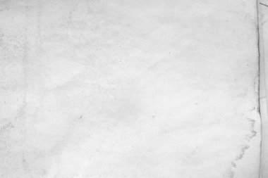 Eski kağıt çarşaf. Toz ve kirli lekelerle dolu boş bir arka plan. Eski ve antika sanat konsepti. Ayrıntılı yakın çekim stüdyo çekimi. Ön manzara. Ayarlanmış