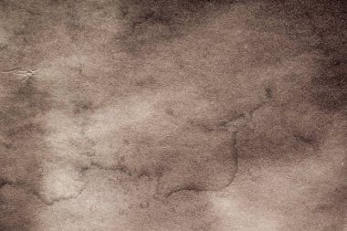 Eski kağıt çarşaf. Toz ve kirli lekelerle dolu boş bir arka plan. Eski ve antika sanat konsepti. Ayrıntılı yakın çekim stüdyo çekimi. Ön manzara. Ayarlanmış