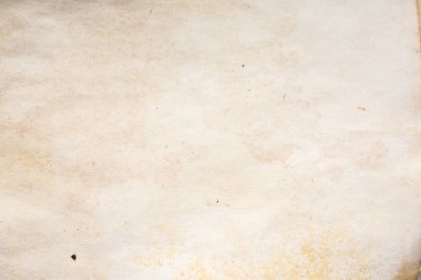 Eski kağıt çarşaf. Toz ve kirli lekelerle dolu boş bir arka plan. Eski ve antika sanat konsepti. Ayrıntılı yakın çekim stüdyo çekimi. Ön manzara. Ayarlanmış