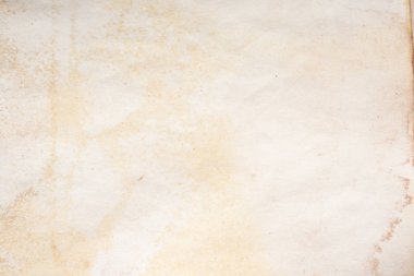 Eski kağıt çarşaf. Toz ve kirli lekelerle dolu boş bir arka plan. Eski ve antika sanat konsepti. Ayrıntılı yakın çekim stüdyo çekimi. Ön manzara. Ayarlanmış