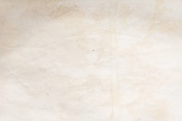 Eski kağıt çarşaf. Toz ve kirli lekelerle dolu boş bir arka plan. Eski ve antika sanat konsepti. Ayrıntılı yakın çekim stüdyo çekimi. Ön manzara. Ayarlanmış