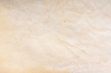 Eski kağıt çarşaf. Toz ve kirli lekelerle dolu boş bir arka plan. Eski ve antika sanat konsepti. Ayrıntılı yakın çekim stüdyo çekimi. Ön manzara. Ayarlanmış