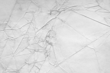 Eski kağıt çarşaf. Toz ve kirli lekelerle dolu boş bir arka plan. Eski ve antika sanat konsepti. Ayrıntılı yakın çekim stüdyo çekimi. Ön manzara. Ayarlanmış