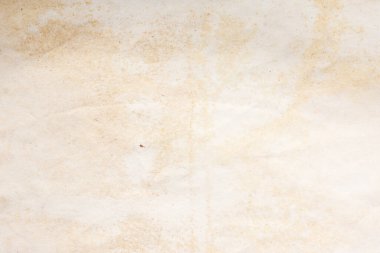 Eski kağıt çarşaf. Toz ve kirli lekelerle dolu boş bir arka plan. Eski ve antika sanat konsepti. Ayrıntılı yakın çekim stüdyo çekimi. Ön manzara. Ayarlanmış