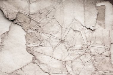 Eski kağıt çarşaf. Toz ve kirli lekelerle dolu boş bir arka plan. Eski ve antika sanat konsepti. Ayrıntılı yakın çekim stüdyo çekimi. Ön manzara. Ayarlanmış