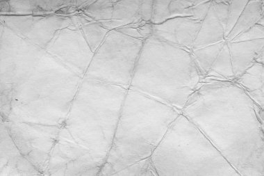 Eski kağıt çarşaf. Toz ve kirli lekelerle dolu boş bir arka plan. Eski ve antika sanat konsepti. Ayrıntılı yakın çekim stüdyo çekimi. Ön manzara. Ayarlanmış