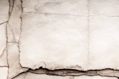 Eski kağıt çarşaf. Toz ve kirli lekelerle dolu boş bir arka plan. Eski ve antika sanat konsepti. Ayrıntılı yakın çekim stüdyo çekimi. Ön manzara. Ayarlanmış