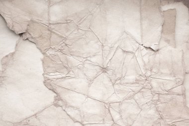 Eski kağıt çarşaf. Toz ve kirli lekelerle dolu boş bir arka plan. Eski ve antika sanat konsepti. Ayrıntılı yakın çekim stüdyo çekimi. Ön manzara. Ayarlanmış