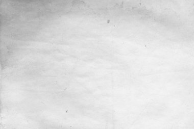 Eski kağıt çarşaf. Toz ve kirli lekelerle dolu boş bir arka plan. Eski ve antika sanat konsepti. Ayrıntılı yakın çekim stüdyo çekimi. Ön manzara. Ayarlanmış