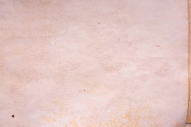 Eski kağıt çarşaf. Toz ve kirli lekelerle dolu boş bir arka plan. Eski ve antika sanat konsepti. Ayrıntılı yakın çekim stüdyo çekimi. Ön manzara. Ayarlanmış