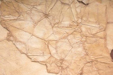 Eski kağıt çarşaf. Toz ve kirli lekelerle dolu boş bir arka plan. Eski ve antika sanat konsepti. Ayrıntılı yakın çekim stüdyo çekimi. Ön manzara. Ayarlanmış