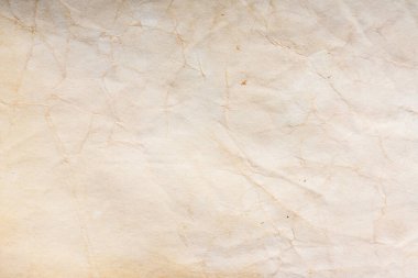 Eski kağıt çarşaf. Toz ve kirli lekelerle dolu boş bir arka plan. Eski ve antika sanat konsepti. Ayrıntılı yakın çekim stüdyo çekimi. Ön manzara. Ayarlanmış