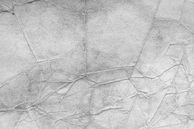 Eski kağıt çarşaf. Toz ve kirli lekelerle dolu boş bir arka plan. Eski ve antika sanat konsepti. Ayrıntılı yakın çekim stüdyo çekimi. Ön manzara. Ayarlanmış