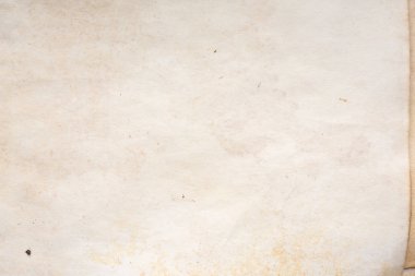 Eski kağıt çarşaf. Toz ve kirli lekelerle dolu boş bir arka plan. Eski ve antika sanat konsepti. Ayrıntılı yakın çekim stüdyo çekimi. Ön manzara. Ayarlanmış