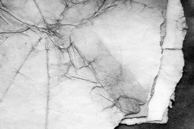 Eski kağıt çarşaf. Toz ve kirli lekelerle dolu boş bir arka plan. Eski ve antika sanat konsepti. Ayrıntılı yakın çekim stüdyo çekimi. Ön manzara. Ayarlanmış