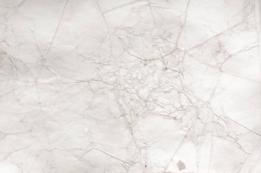 Eski kağıt çarşaf. Toz ve kirli lekelerle dolu boş bir arka plan. Eski ve antika sanat konsepti. Ayrıntılı yakın çekim stüdyo çekimi. Ön manzara. Ayarlanmış
