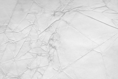 Eski kağıt çarşaf. Toz ve kirli lekelerle dolu boş bir arka plan. Eski ve antika sanat konsepti. Ayrıntılı yakın çekim stüdyo çekimi. Ön manzara. Ayarlanmış