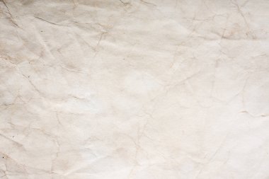 Eski kağıt çarşaf. Toz ve kirli lekelerle dolu boş bir arka plan. Eski ve antika sanat konsepti. Ayrıntılı yakın çekim stüdyo çekimi. Ön manzara. Ayarlanmış