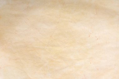 Aged paper sheet. Blank old background with dust and dirty stains. Vintage and antique art concept. Poster mockup. Detailed closeup studio shot. Front view. Toned