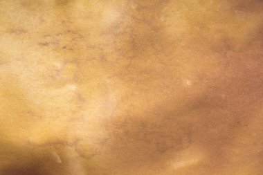 Aged paper sheet. Blank old background with dust and dirty stains. Vintage and antique art concept. Poster mockup. Detailed closeup studio shot. Front view. Toned