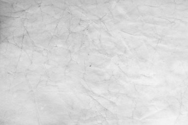 Eski kağıt çarşaf. Toz ve kirli lekelerle dolu boş bir arka plan. Eski ve antika sanat konsepti. Ayrıntılı yakın çekim stüdyo çekimi. Ön manzara. Ayarlanmış