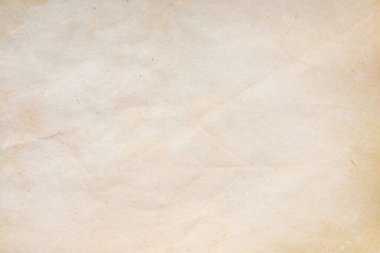 Aged paper sheet. Blank old background with dust and dirty stains. Vintage and antique art concept. Poster mockup. Detailed closeup studio shot. Front view. Toned